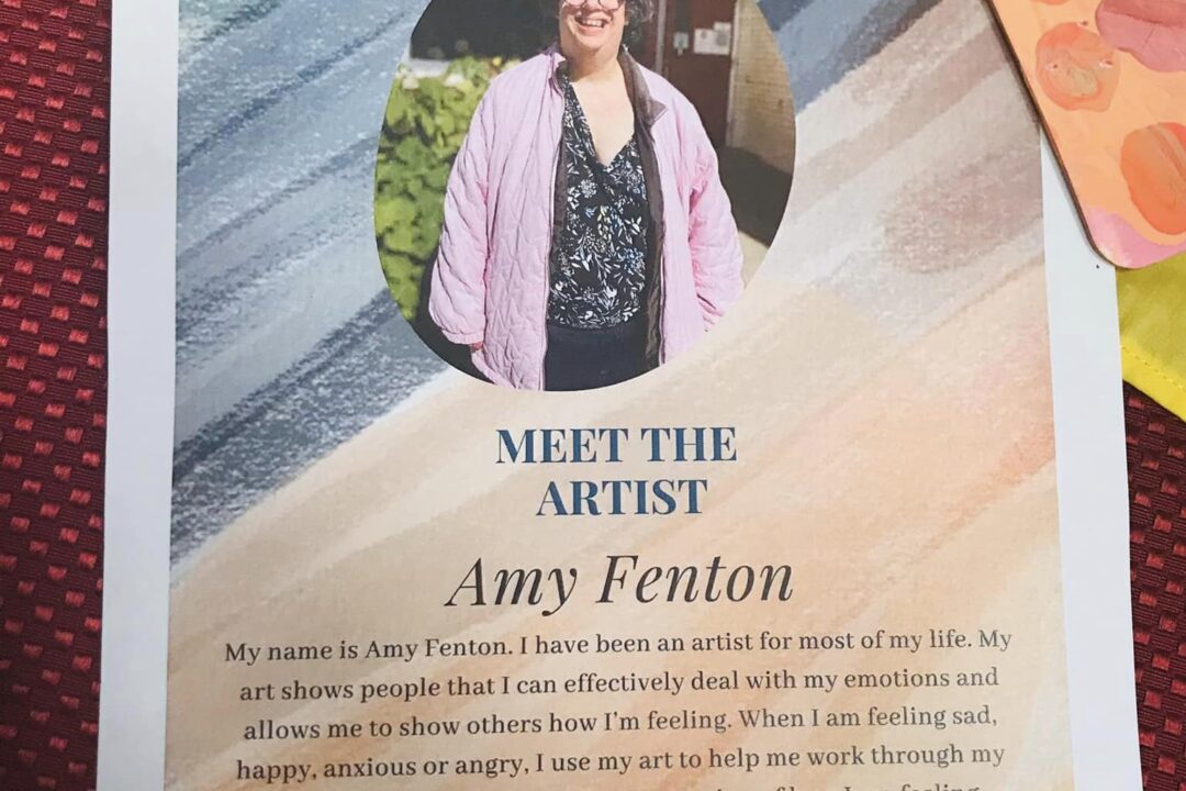 A printed flyer introducing artist amy fenton with her portrait and a personal message about her artistry and mission.
